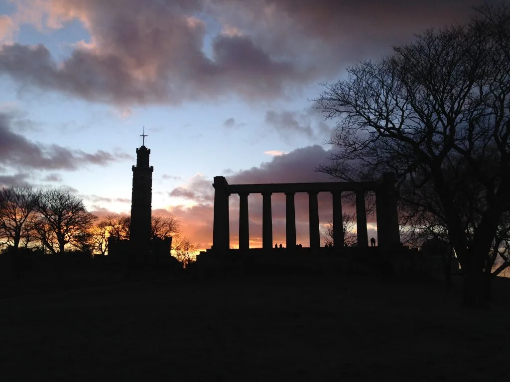 calton hill monuments at sunset
