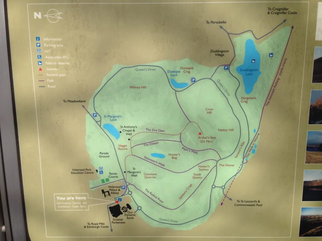 hiking trail map of arthurs seat and holyrood park sign outside scottish parliament
