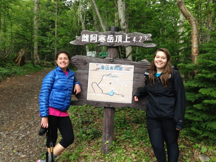 at the trail map for mount meakan dake in hokkaido