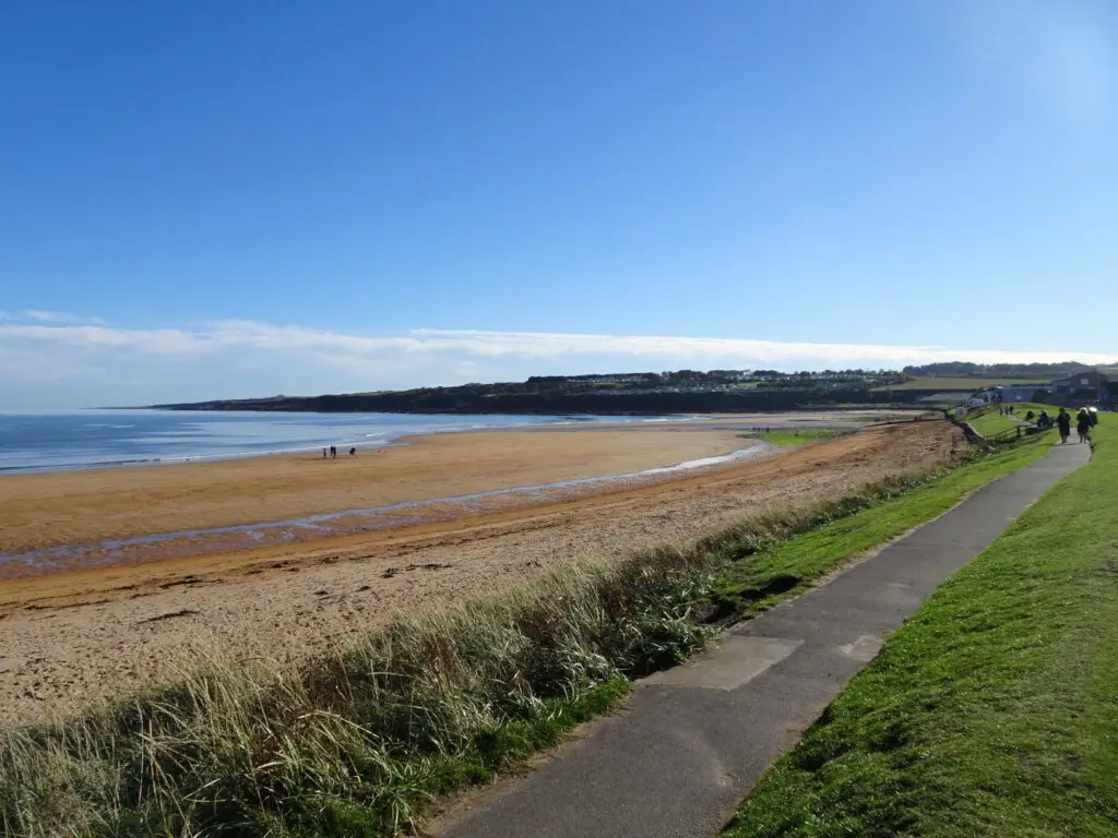 east sands beach st andrews fife coastal path blue sky sunny day