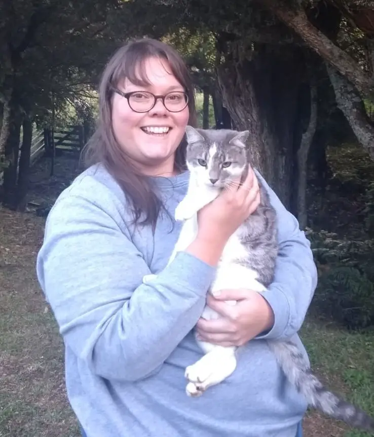 lauren holding cat outside
