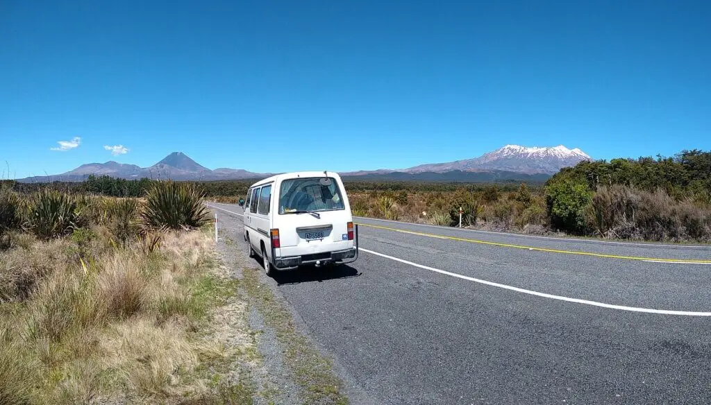 campervan on road in tongariro national park new zealand