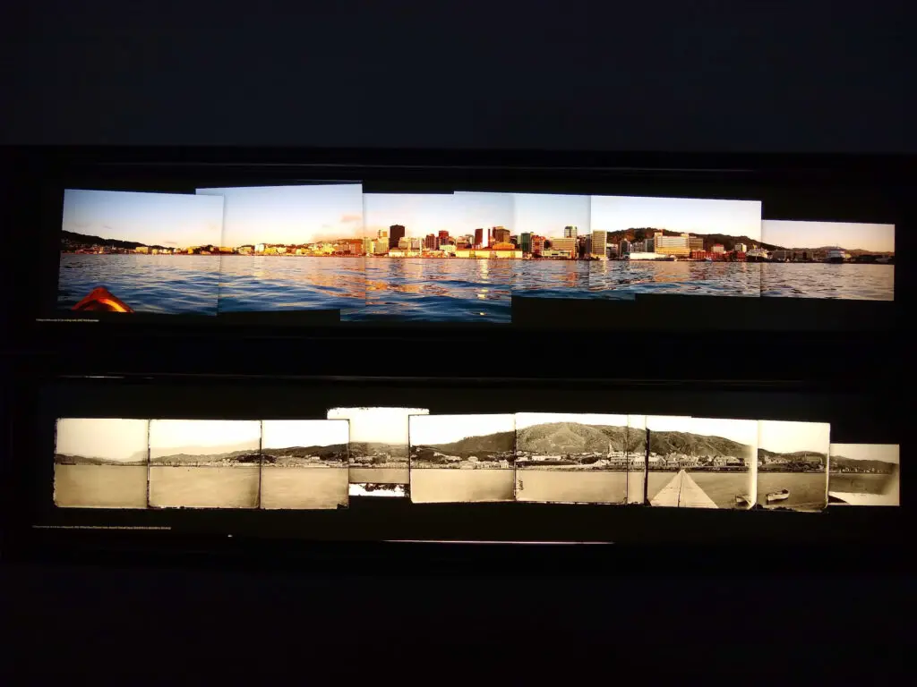 collage photographs on display at the wellington museum showing a panoramic view of wellington in the early 1900s and in the 2000s