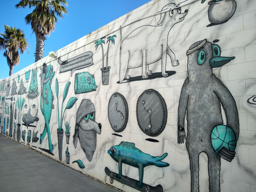 white and blue street art mural on a wall in mount maunganui bay of plenty north island new zealand