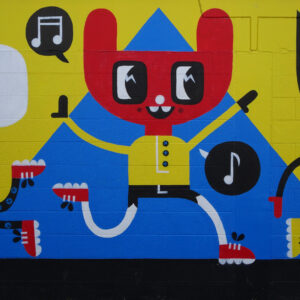 colorful street art character on a wall in taupo new zealand