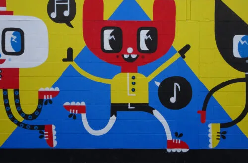 colorful street art character on a wall in taupo new zealand