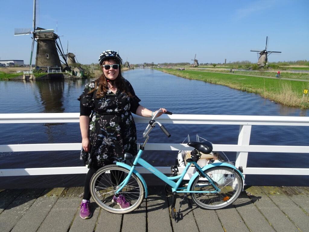 lauren with bike at kinderdijk the netherlands