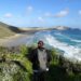 lauren viewing te werahi beach at cape reinga in northland new zealand - unmissable north island experience