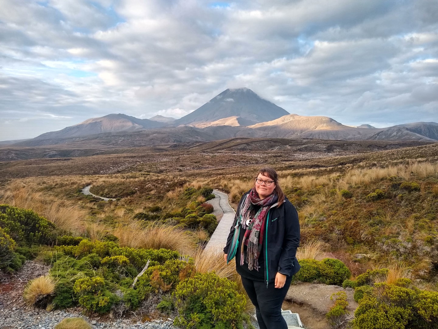 lauren standing on the tama lakes track in tongariro national park - must do north island experience in new zealand