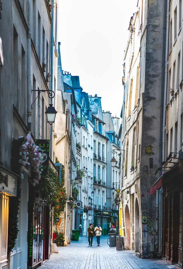 beautiful laneway with old buildings in le marais district paris france