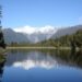 view of lake matheson from the reflection island viewpoint fox glacier