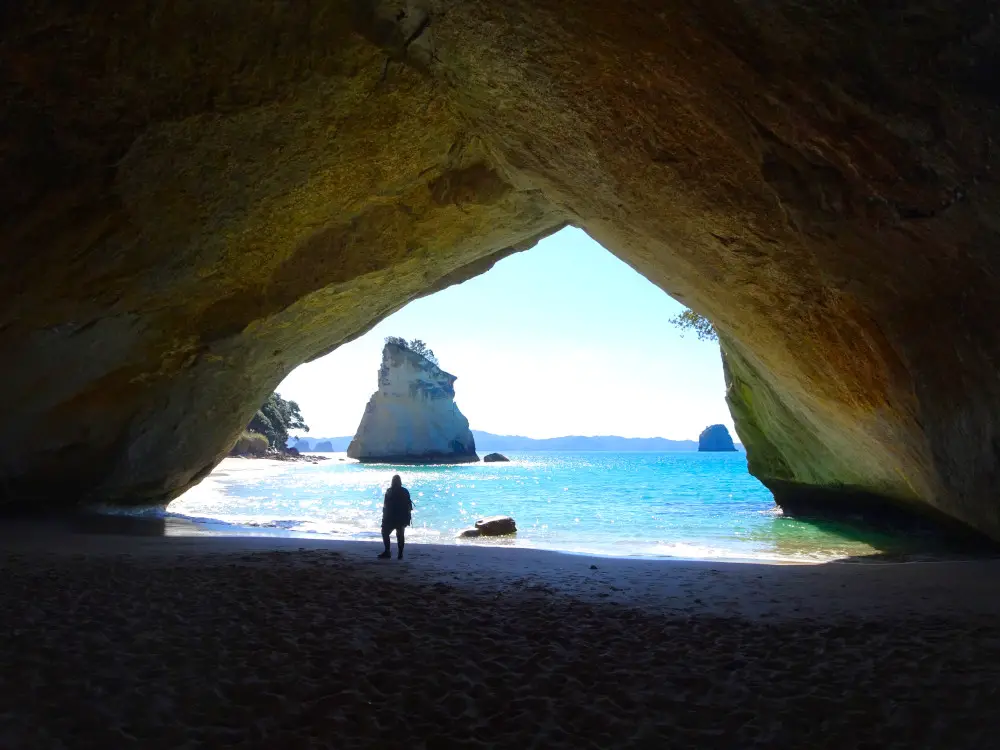lauren at cathedral cove beach in coromandel in the north island of new zealand