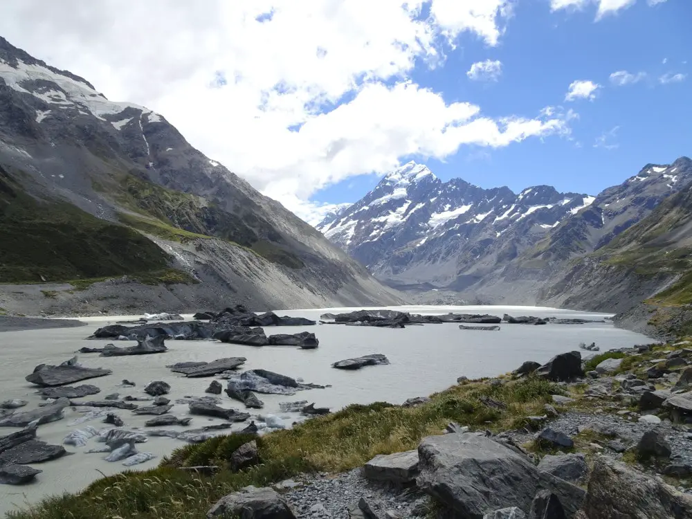hooker lake with icebergs and hooker glacier and mount cook in the background