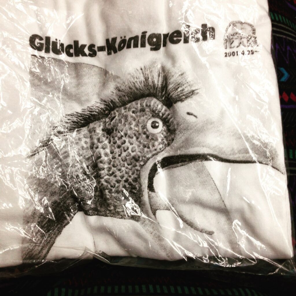 glucks-konigreich gluck kingdom t-shirt with a weird bird on it in black and white print - abandoned german theme park in hokkaido japan