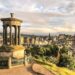 calton hill edinburgh view with dugald stewart monument, balmoral hotel and edinburgh castle - everything you need to know about calton hill in edinburgh - wild lovely world travel blog