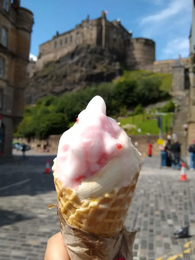 holding gelato icecream from marys milk bar in grassmarket with edinburgh castle in background