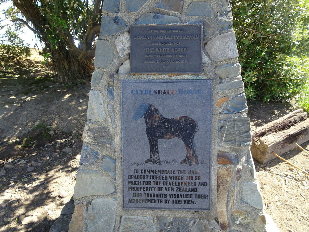 stone monument with a plaque that commemorates clydesdale horses in waitmate