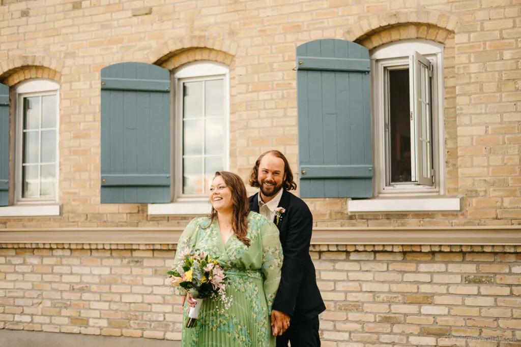 lauren and fiachra smiling on their wedding day