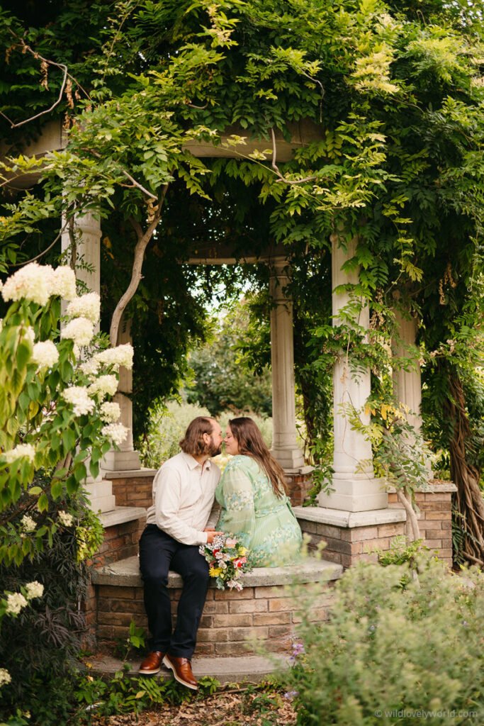 lauren and fiachra in waterloo park on their wedding day