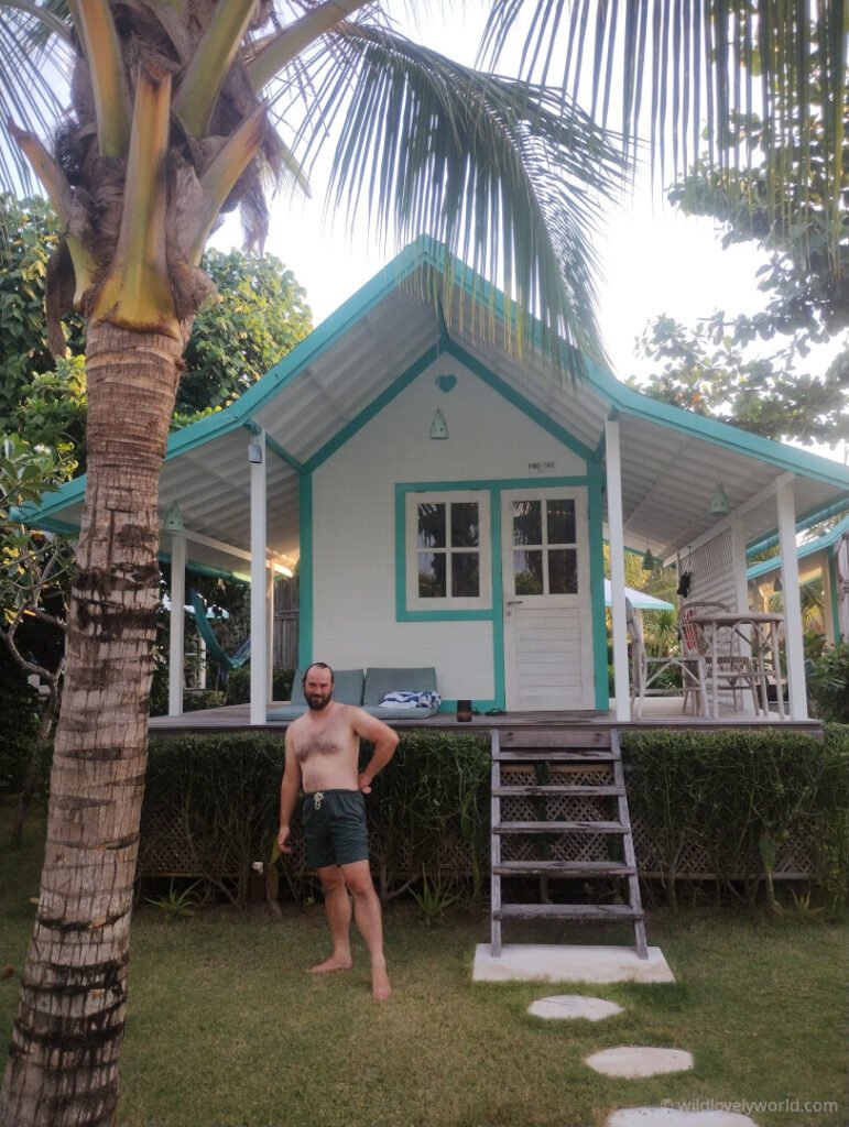 fiachra standing outside our sweet room at le pirate resort gili meno