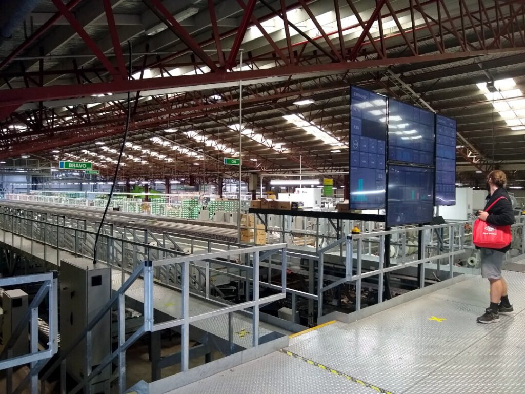 interior of the eastpack washer road kiwifruit packhouse showing production lines and screens